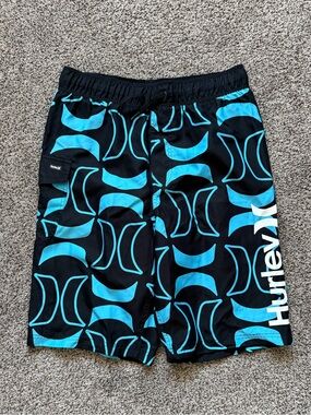 Boy’s Hurley Black And Blue “H” Logo Pattern Swim Trunks